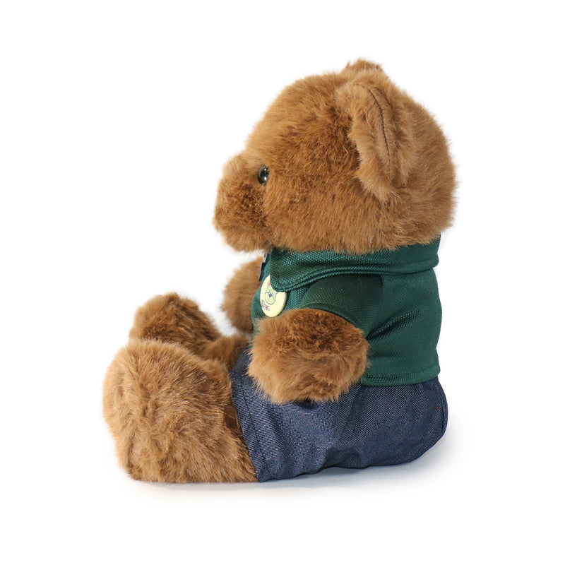 Plush squirrel toy wearing a green shirt and blue pants on a white background