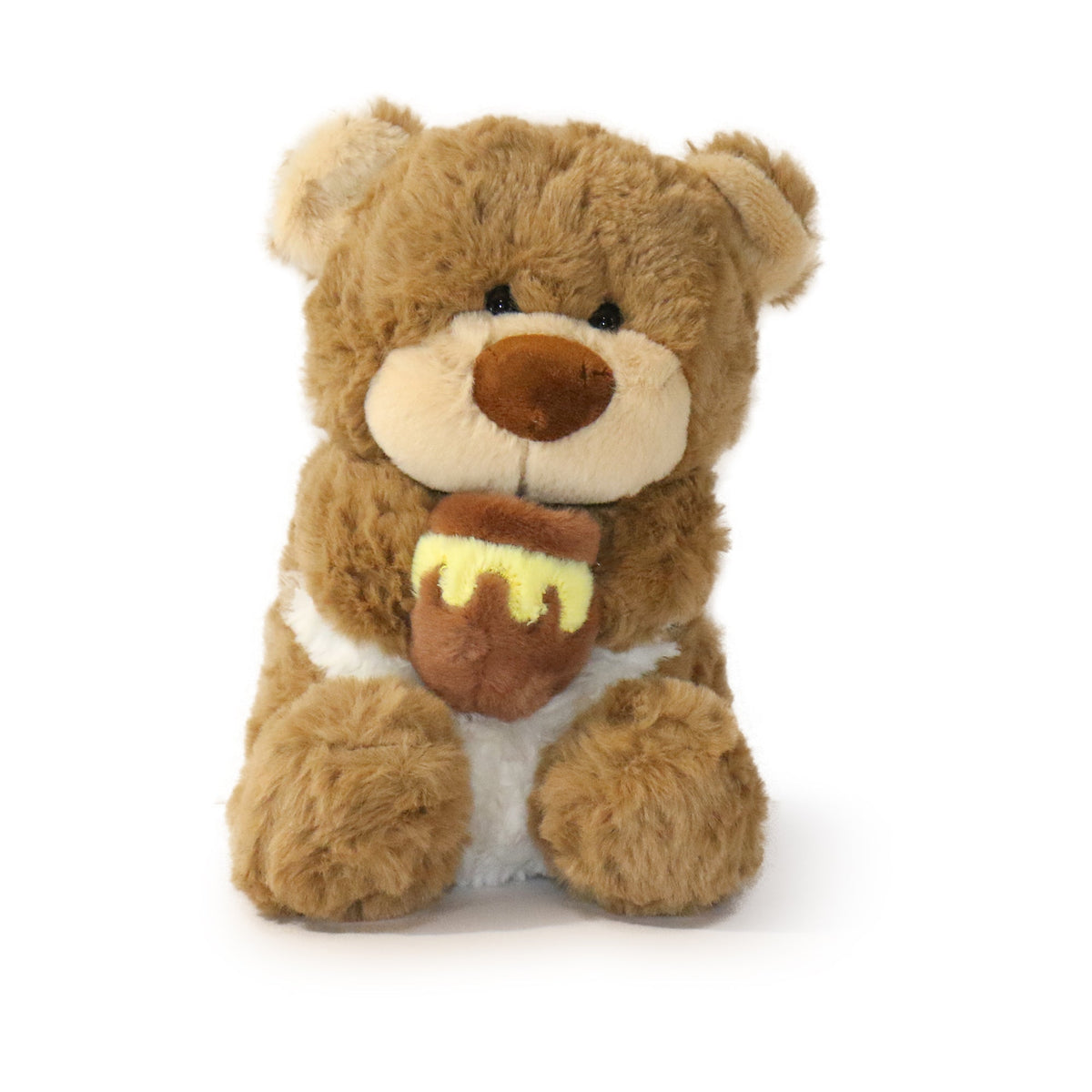 Plush teddy bear holding a honey jar on a white background