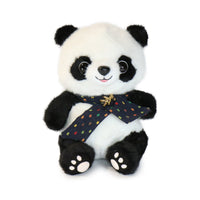 Plush panda bear toy with a colorful bow tie on a white background