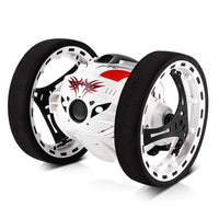Toy car with large wheels on a white background