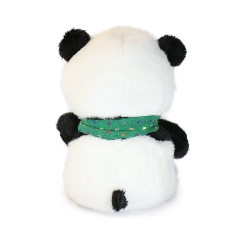 Plush panda toy with a green scarf on a white background