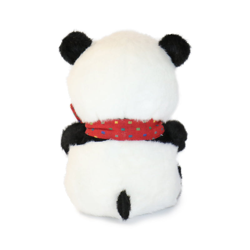 Plush panda toy with a red scarf on a white background
