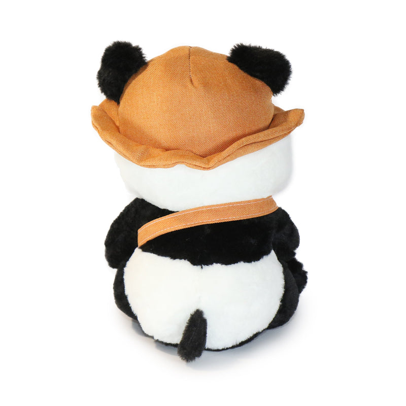 Plush toy panda wearing a brown hat on a white background