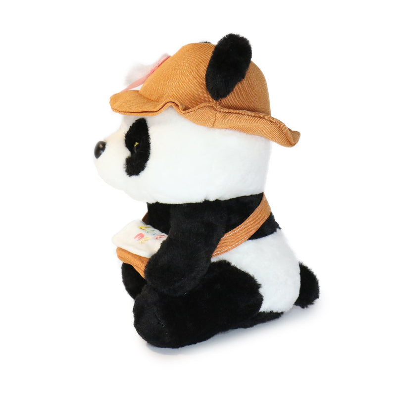 Plush toy panda wearing a brown hat and backpack on a white background