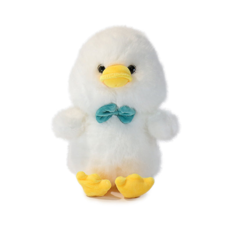 Plush toy duck with a bow tie on a white background