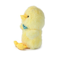Yellow plush duck toy on a white background