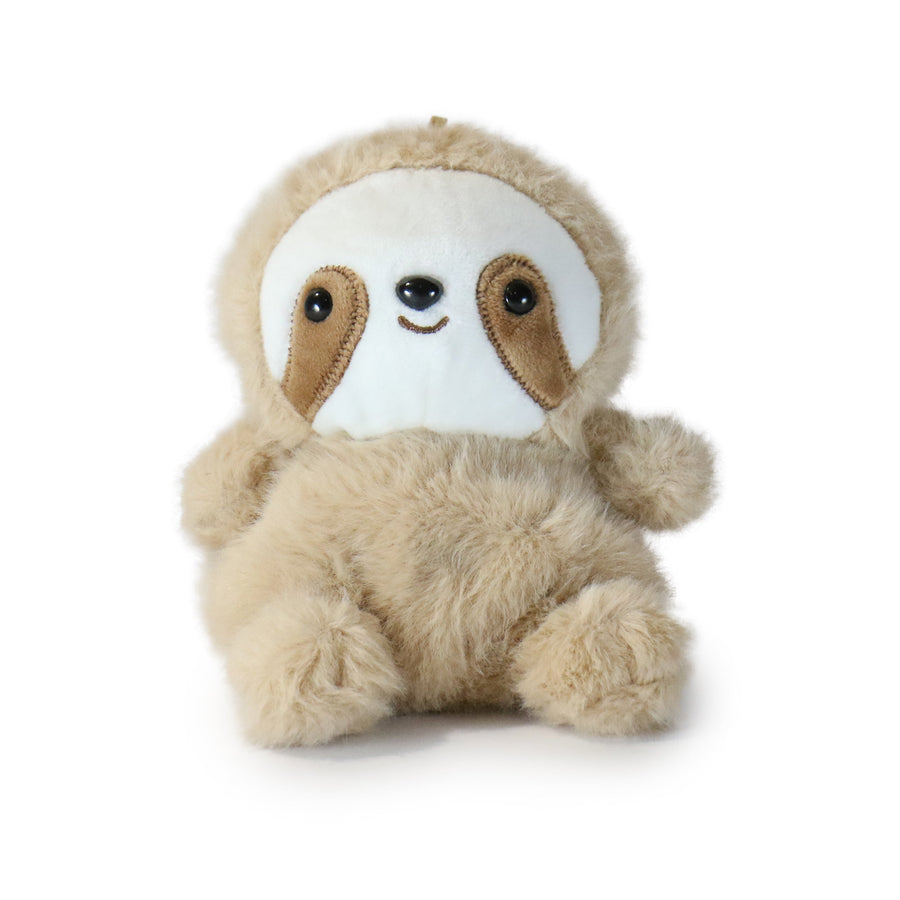 Plush toy sloth on a white background