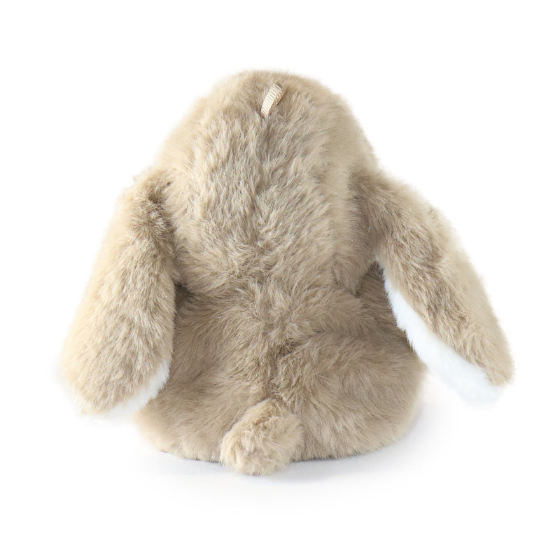 Plush toy shaped like a rabbit on a white background