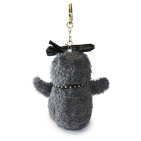 Gray plush keychain with a black bow and gold accents on a white background
