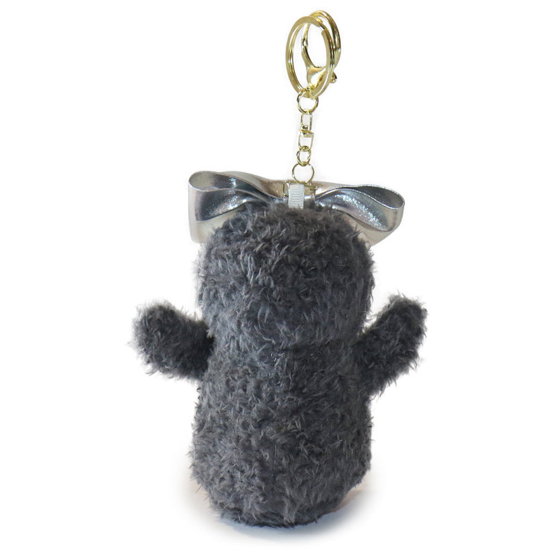 Gray plush keychain with a bow on a white background