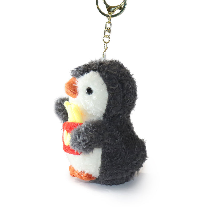 Plush penguin keychain on a white background