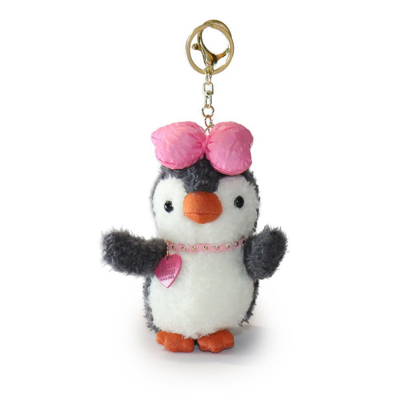Plush penguin keychain with a pink bow and heart on a white background