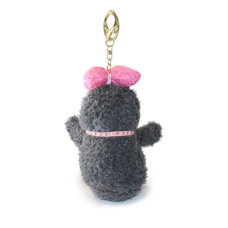 Gray plush keychain with pink bow and gold clasp on a white background