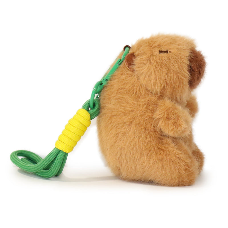 Plush animal toy with a green and yellow rope on a white background