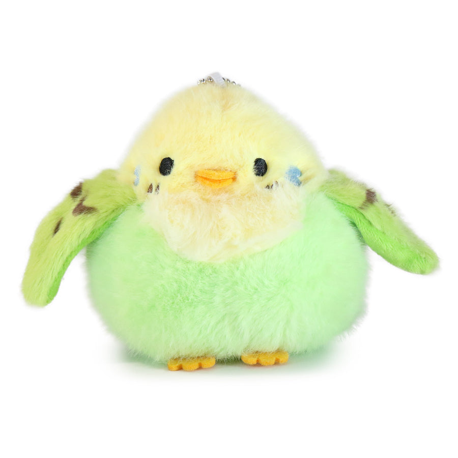 Plush toy chick with green body and yellow face on a white background
