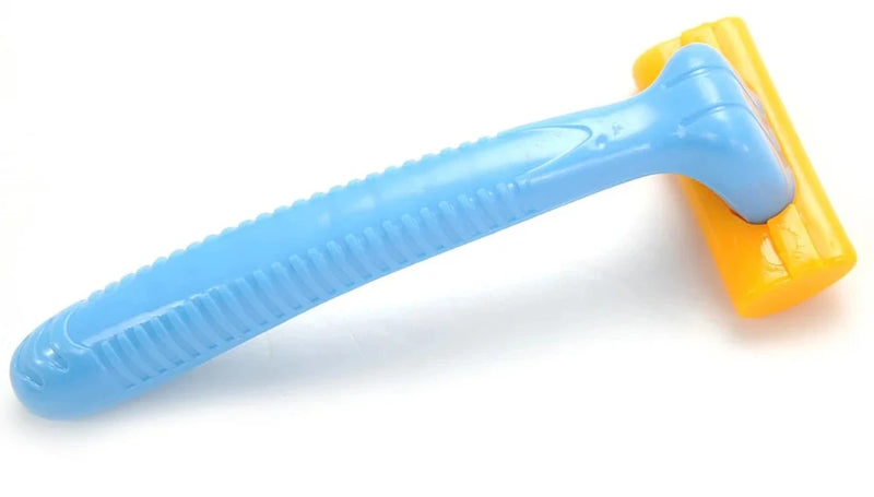 Blue and yellow toy shaving razor from Bigboy play set, part of the kids' grooming and fashion play accessories