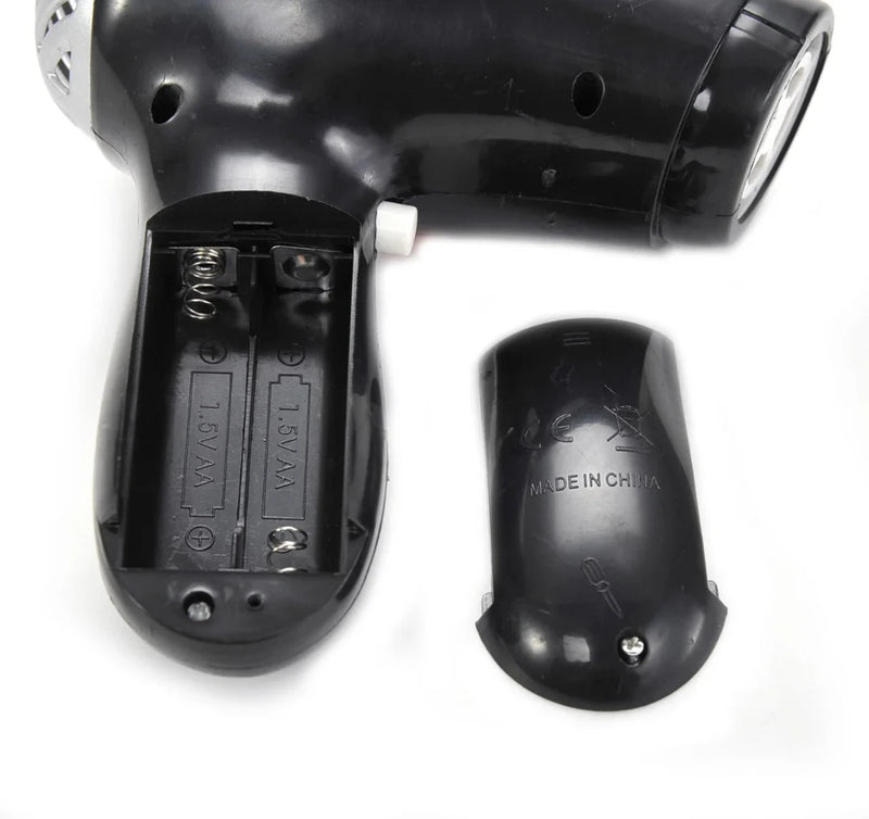 Bigboy toy hair dryer showing the open battery compartment for easy replacement. Part of the kids' fashion playset.