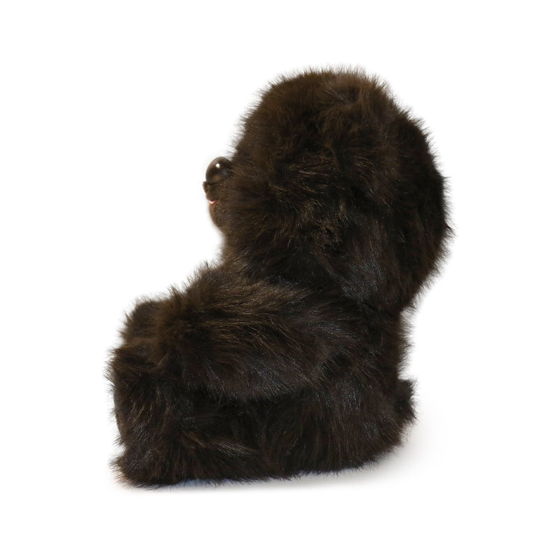 Brown fur boot on a white background