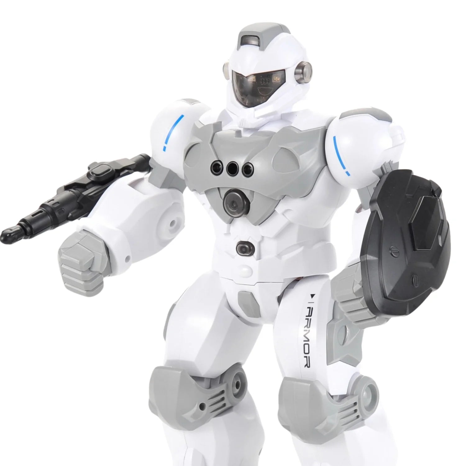  Close-up view of a remote control robot toy in white and gray with a sleek design and equipped with a shield and gun.