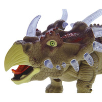 Close-up view of the Triceratops dinosaur toy detailing textured skin, glowing horns, and lifelike eyes.