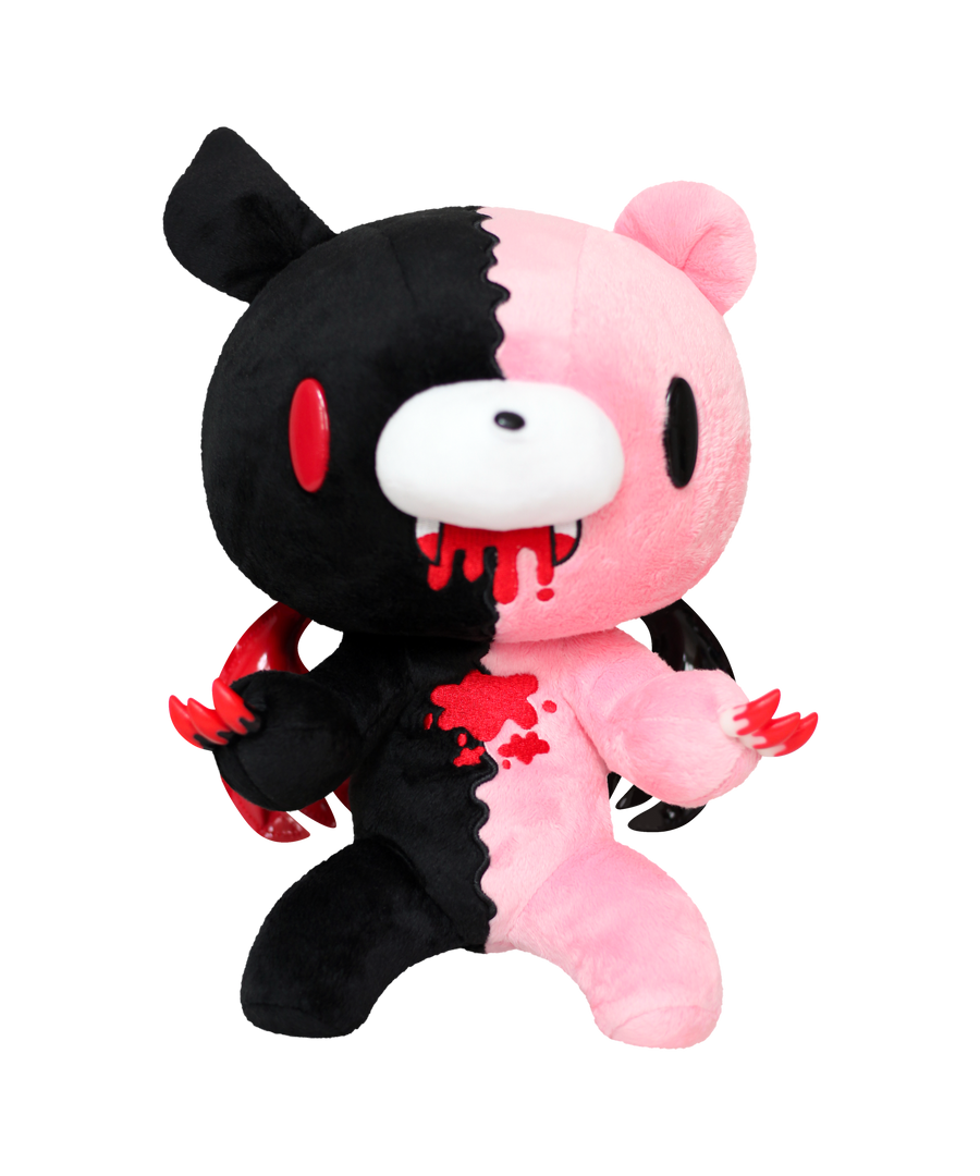Plush toy with black and pink design on a white background