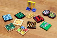 Collection of various board games on a wooden surface