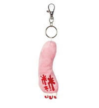 Pink plush keychain with red designs on a white background