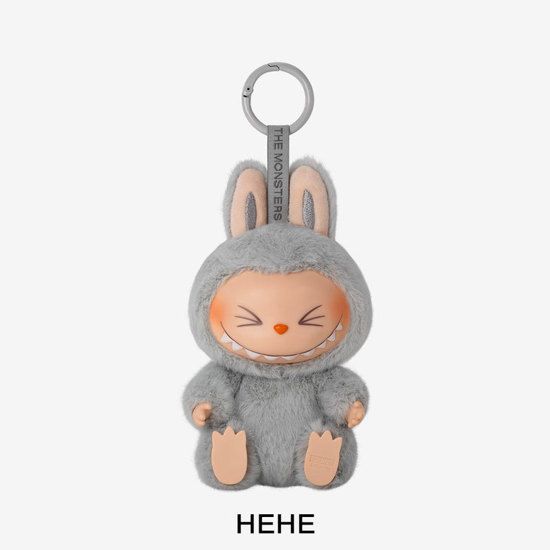 Plush keychain in a gray bunny costume with 'HEHE' text on a white background