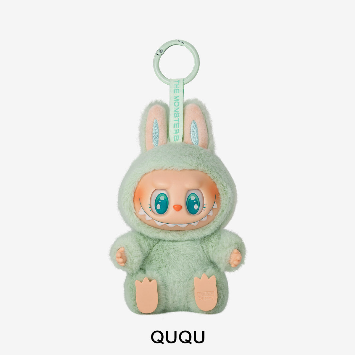 Plush toy character in a green outfit with 'QUQU' branding on a white background