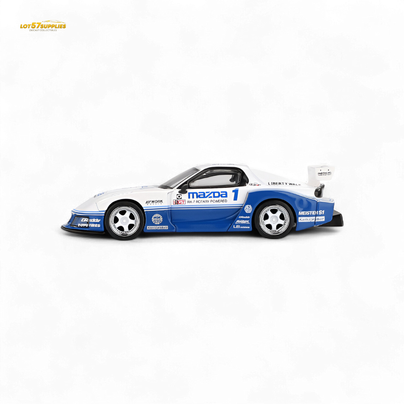 Model race car with Mazda branding on a white background