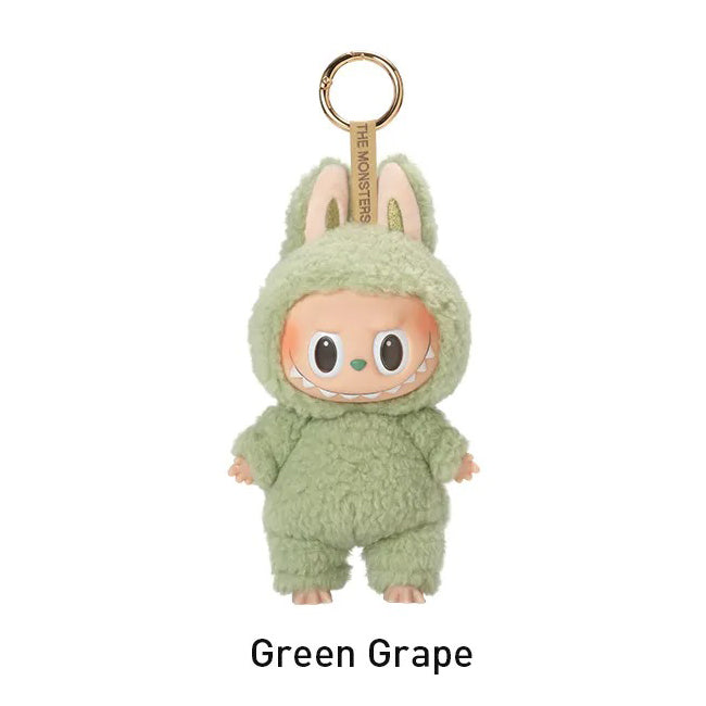 Plush keychain in green grape color with bunny ears on a white background