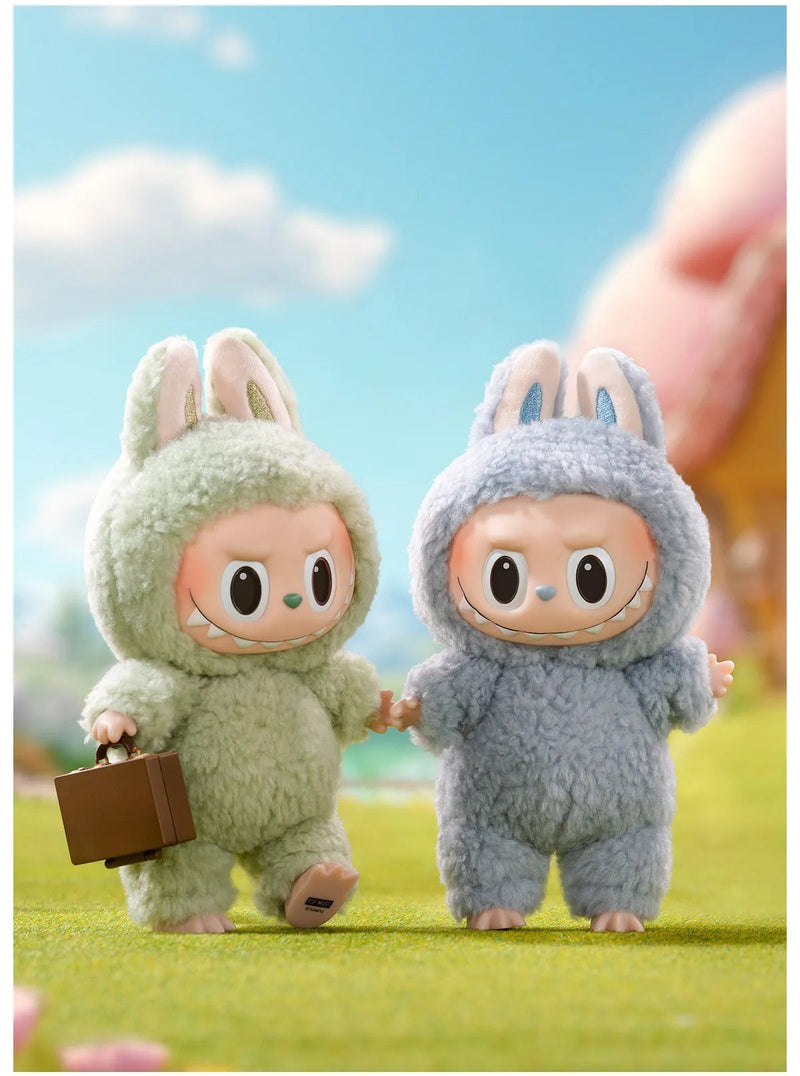 Two cartoon characters in bunny costumes standing on grass with a blue sky background