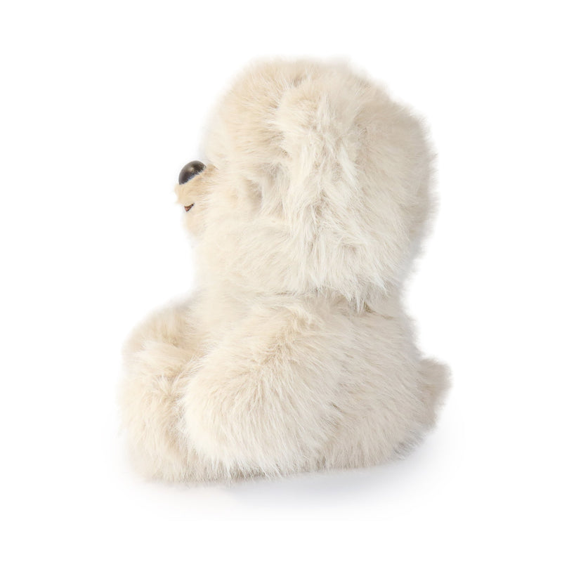 Plush polar bear toy on a white background