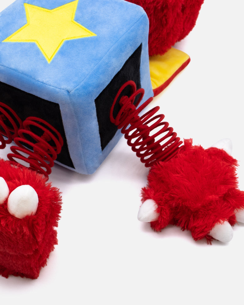 Colorful plush toy with a star on a white background