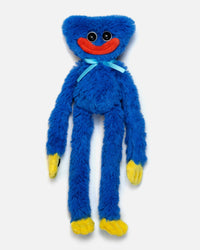 Blue plush toy with a red mouth and yellow feet on a white background