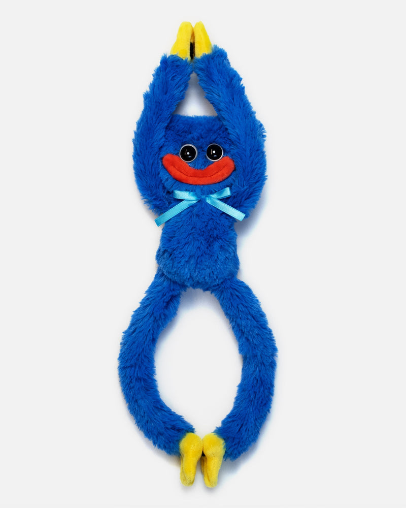 Blue plush toy with a face on a white background
