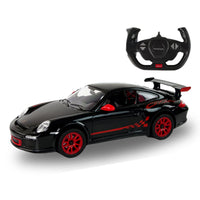 Black sports car with red accents on a white background