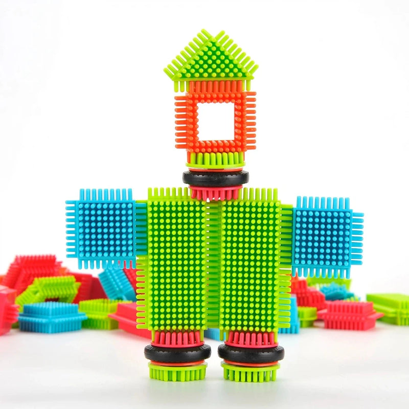 Robot figure constructed using the bristle blocks toy set, encouraging imaginative play for children