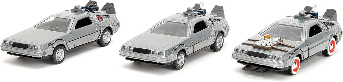 Three model cars resembling a famous vehicle from a science fiction movie, displayed side by side.