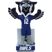 Plush toy of a mascot in a blue uniform with number 12, on a white background