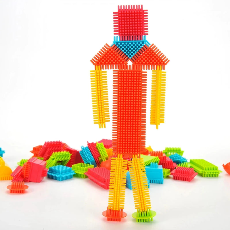 Standing figure built with bristle blocks, demonstrating creativity and educational fun with bristle blocks toys.