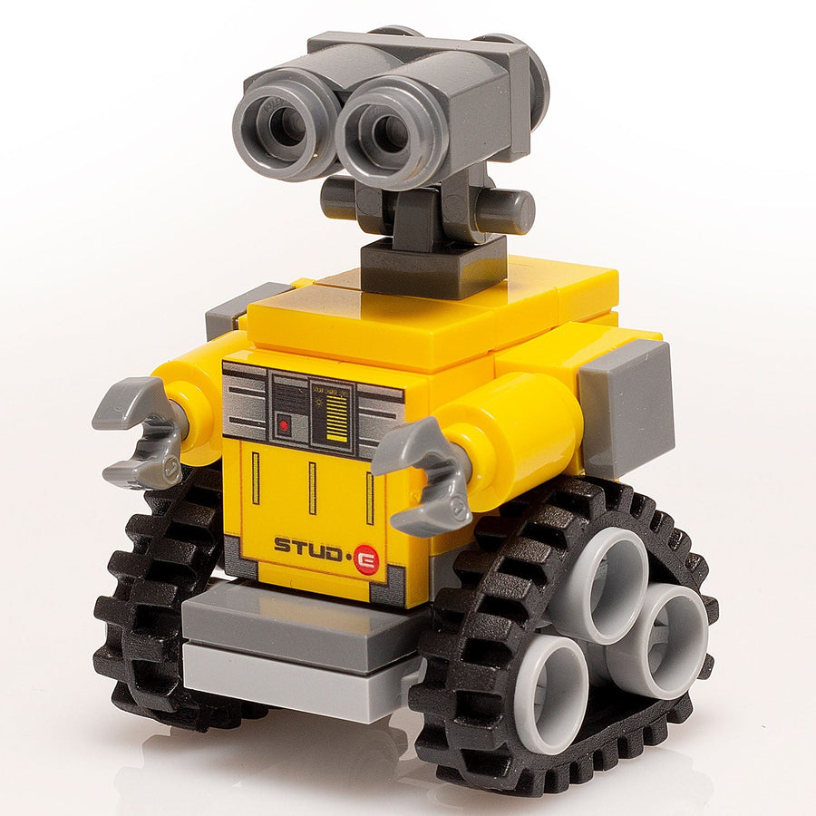 Toy robot model made of interlocking bricks on a white background