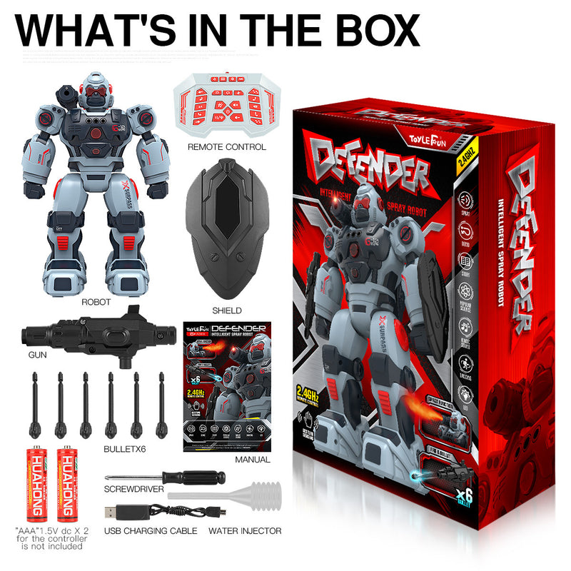 Contents of the Defender robot toy box including the robot, shield, remote, bullets, gun, and manual.