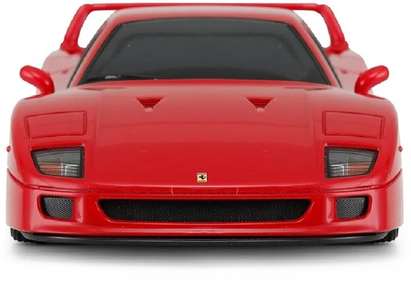 Red sports car model with Ferrari logo on a white background