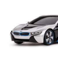 Side view of the BMW i8 RC car in sleek white and black design