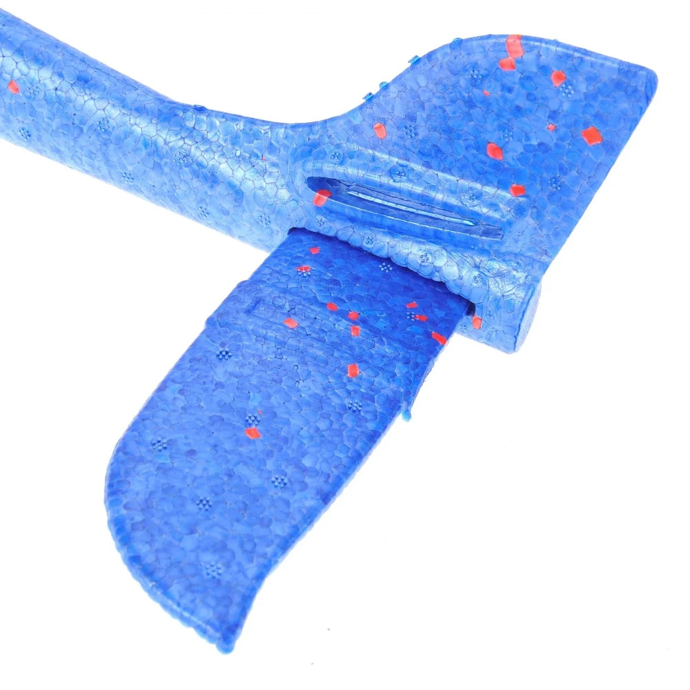 Close-up of the tail section on a blue glider airplane toy, showing EPP foam material and easy assembly