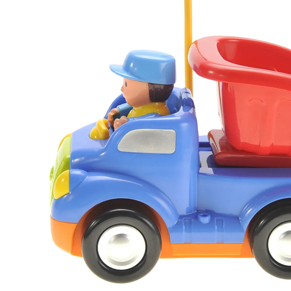 Close-up of dump truck toy with driver figure in the driver’s seat