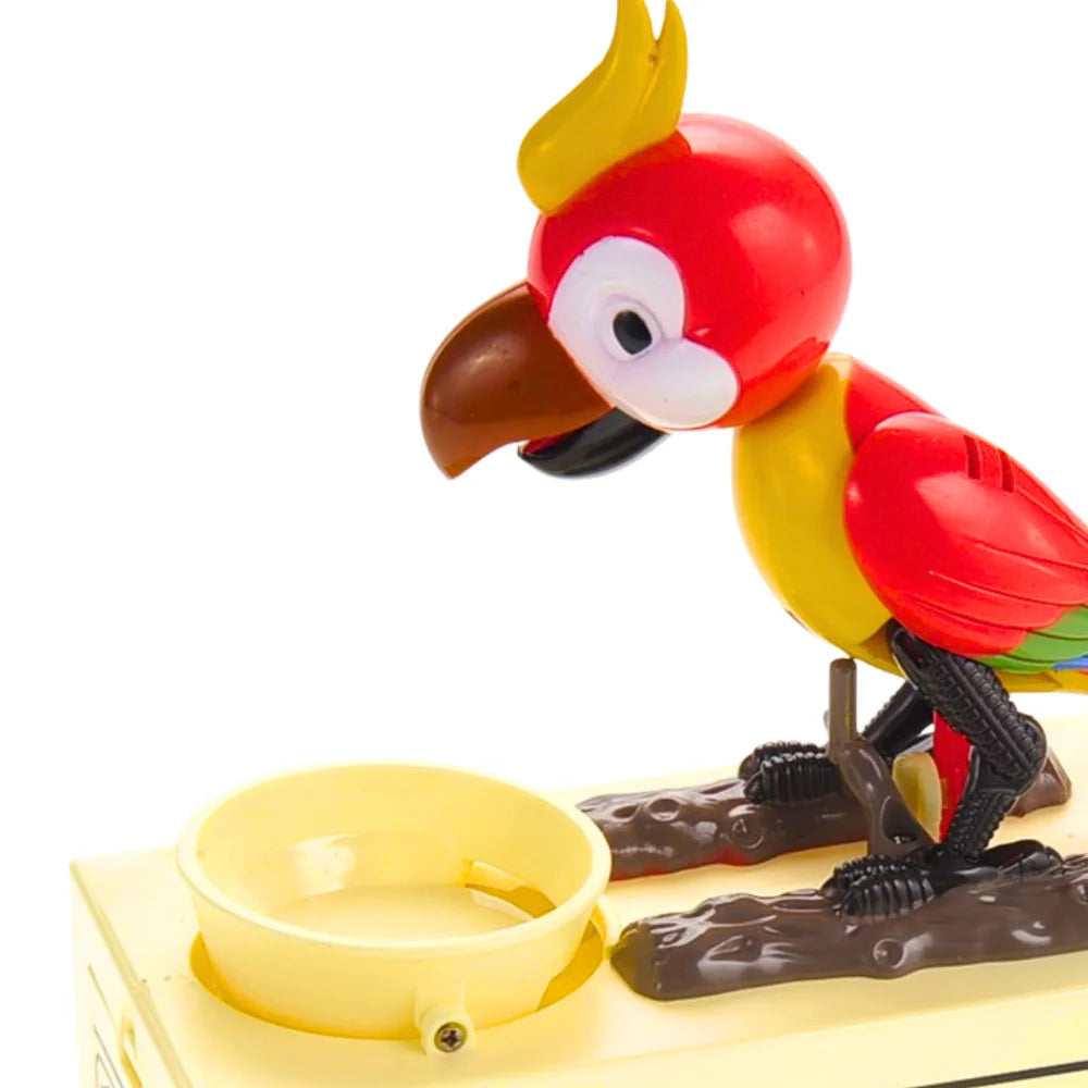  Close-up of the Parrot Coin Bank's feeding bowl where coins are placed, with the parrot in a feeding position.