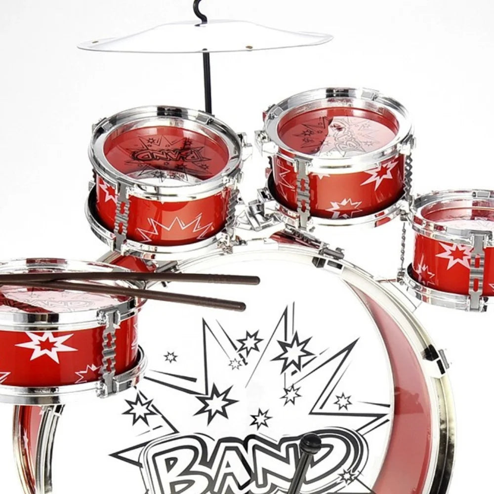 Close-up of toddler drum set with drumsticks and red drum bodies, ideal for children's first drumming experience