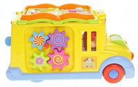 Side view of a colorful learning school bus toy featuring colorful spinning gears for kids' educational play.